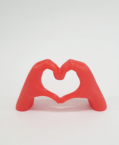 Χέρια σε σχημα καρδιάς