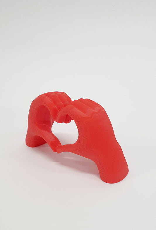 Χέρια σε σχημα καρδιάς