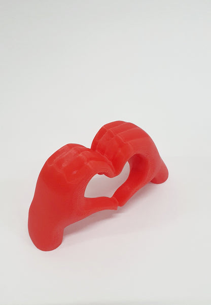 Χέρια σε σχημα καρδιάς