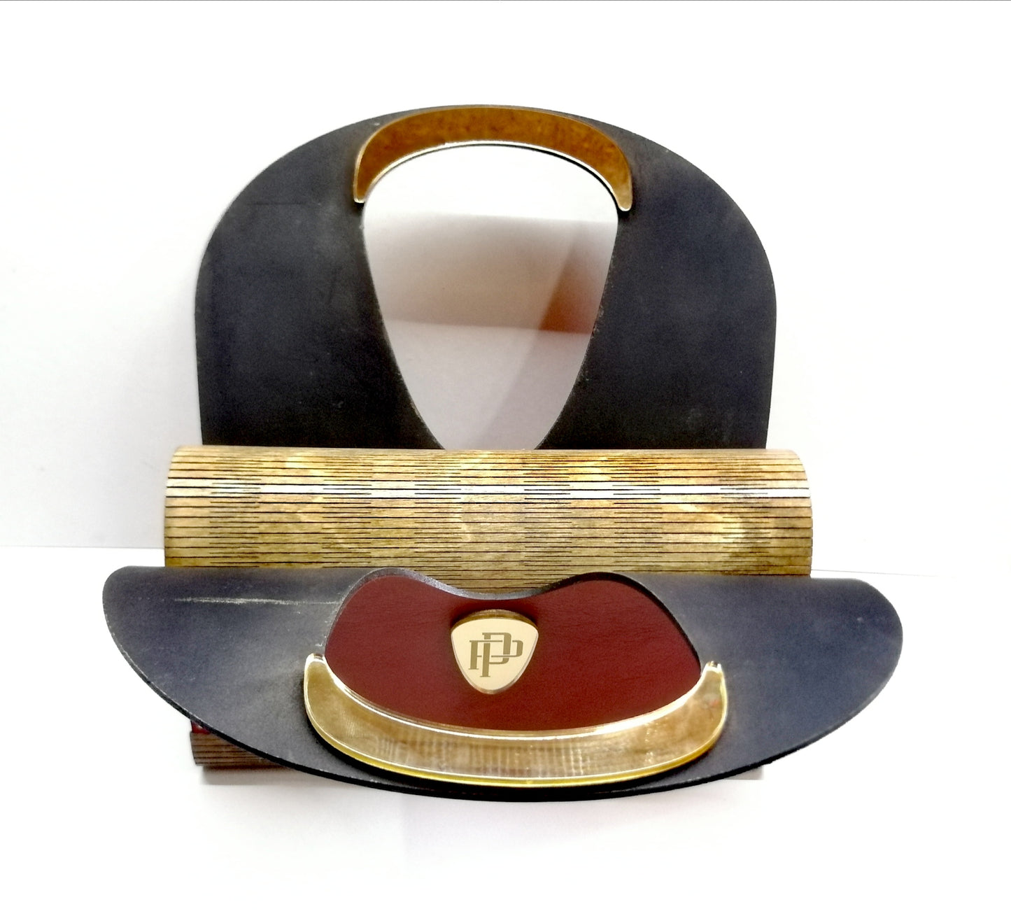 ΤΣΑΝΤΑ ΑΠΟ ΞΥΛΟ ΚΑΙ ΔΕΡΜΑ ΜΕ ΑΝΑΓΛΥΦΑ ΠΛΑΪΝΑ